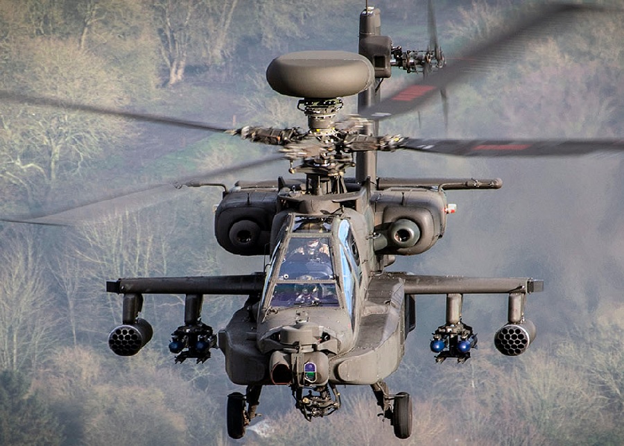 Historic Military Milestone: Dutch Apaches Now Armed with Cutting‑Edge AGM‑179A Missiles 4 AH‑64E Apache over forested terrain