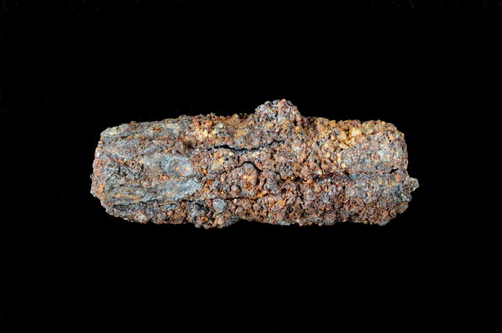 5,000-Year-Old Meteorite Beads Found in Egypt—Could This Be the Birth of Human Metalwork? 2 Corroded iron bead close-up