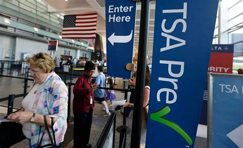 Armed Passenger Caught at Boston Logan—TSA Activates Emergency Protocols Amid Rising Threats 3 TSA PreCheck signage and passengers